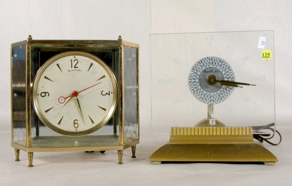 2 Mastercrafters Electric Table Clocks: 2 Mastercrafters Electric Table Clocks: 1.) Model #146 "Starlight" with a glass dial and embossed numbers on a glass plate; set in a metal base. Running at this time. (Slight scratches to base.) 9" x 