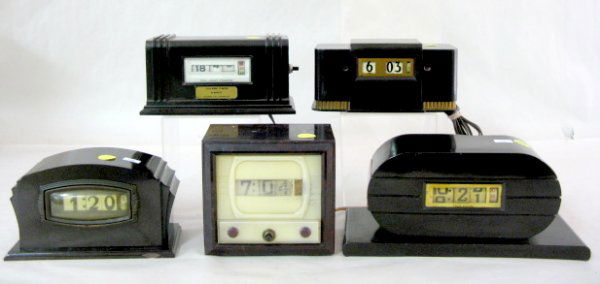 5 Digital Electric Clocks in Bakelite Cases: 5 Digital Electric Clocks in Bakelite Cases: 1.) Tele-Vision T.V. model, 4 1/2" and running at this time. (Front cover damaged) 2.) G.E. 8B04 (Not running.) 3.) Call-ident Tymeter, running at this tim