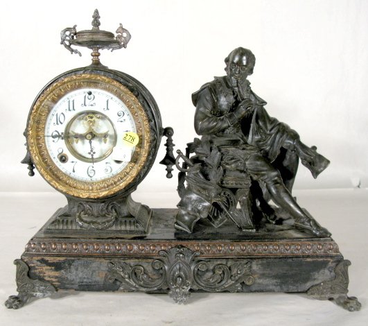 Ansonia Shakespeare Statue Clock: Ansonia Shakespeare Statue Clock: 8 day time with half hour gong striking movement. With a 5 1/2" dial and visible escapement. (Not running. The top notch is damaged. The cap to the bent piece is with