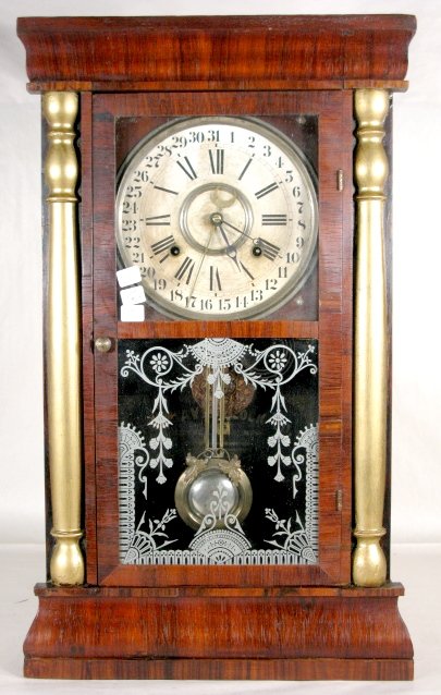 Davis Clock Co. Calendar Shelf Clock: Davis Clock Co. Calendar Shelf Clock: from Columbus Mississippi. It has a 8" paper dial. Spring driven time and gong striking movement. In a rosewood and veneer case with repainted gold half columns. 