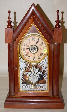 Portugal Time & Strike Steeple w/Alarm: Portugal Time & Strike Steeple w/Alarm: time and strike; 24 hour dial; stenciled glass; nice label on back. 20" tall All items sell As Is, Where Is, no guarantees of any kind. We accept Mastercard & V