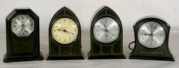 4 Vintage Electric Alarm Clocks: 4 Vintage Electric Alarm Clocks 1.) Hammond Clock Co. arch style case alarm clock. Running at this time; no condition problems. 7" 2.) Hammond Clock Co. arch style case alarm clock; Adams on the dial.