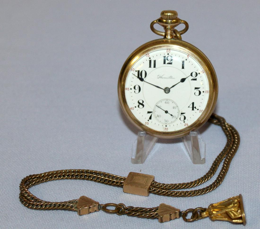 Hamilton 992 21J 16S OF Pocket Watch: Hamilton 992 21J 16S OF Pocket Watch: LS DR ADJ 5P DMK GJS No.1114232 PW, in a yellow SF&B 20yr No.4308166 Victory case with scuffing, wear and denting, the DSD has hairlines, attached is a chain with