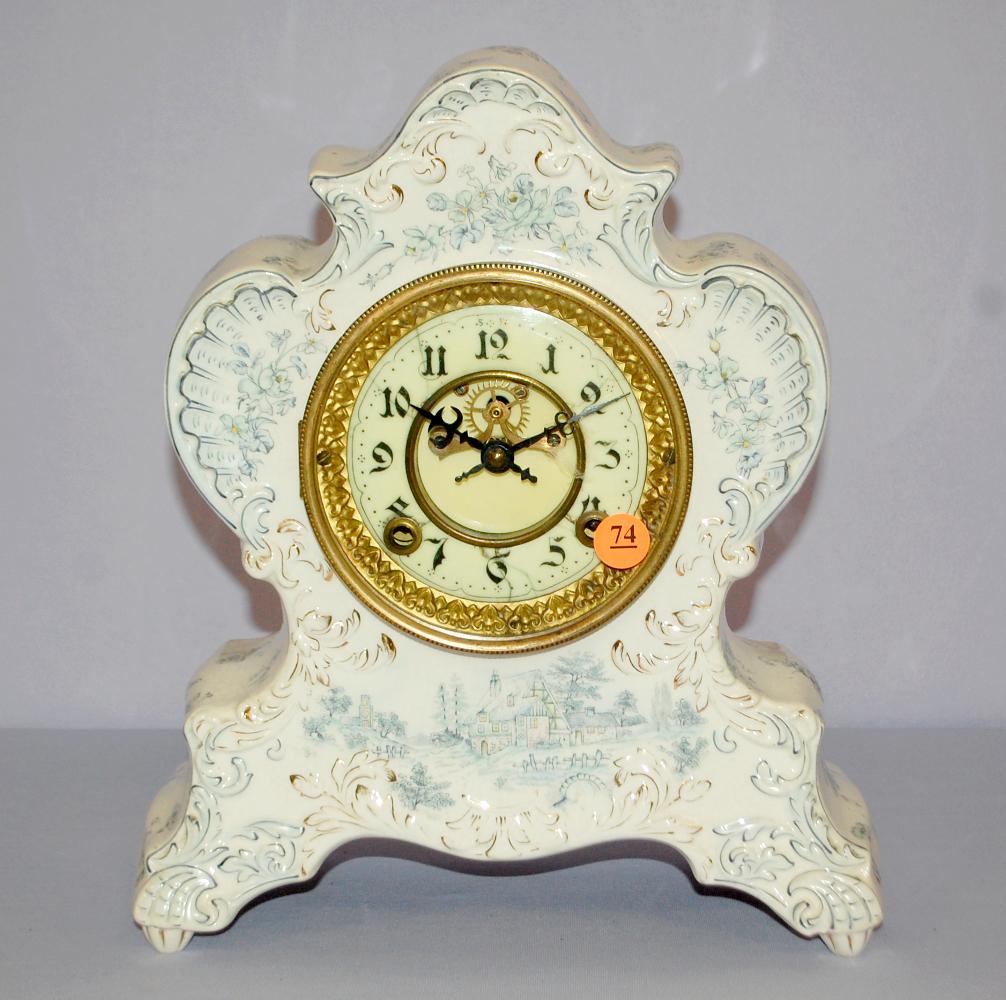 New Haven Porcelain Clock: New haven Porcelain Clock. Blue and white, porcelain dial, open escapement. 12" Tall.