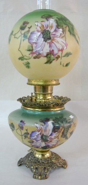 Floral Painted Electric Gone With The Wind Lamp: Floral Painted Electric Gone With The Wind Lamp: unmarked metal base with yellow to green bowl enamel painted with a large flower and leaves; matching ball shade; unmarked burner; flame spreader marke