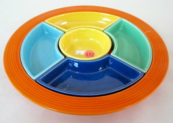 Colorful Fiesta Relish Tray Set: Fiesta Relish Tray Set: 1.) Coral base; incised mark, 10 3/4" diameter 2.) Yellow center bowl; incised mark, 3 1/2" 3.) Cobalt tray; incised mark 4.) Yellow tray 5.) Medium green tray 6.) Turquoise tr