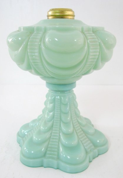 Green Custard Bellevue/Coolidge Drape Kero Lamp: Green Custard Bellevue/Coolidge Drape Kerosene Lamp: made by the Pittsburgh Co. (Collar is loose.) 9 1/2" tall All items sell As Is, Where Is, no guarantees of any kind. We accept Mastercard & Visa, n