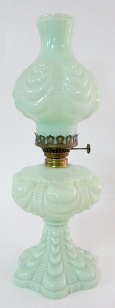 Green Custard Bellevue/Coolidge Drape Kero Lamp: Green Custard Bellevue/Coolidge Drape by Pittsburgh Lamp Co. Kerosene Lamp: with matching shade; no name on burner. (2" Crack across one drape on base. See Photos) 19 1/2" tall All items sell As Is, W