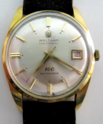 Waltham Centennial Autochron Wrist Watch: Waltham Centennial Autochron Wrist Watch: stainless steel back with W emblem. Not opened by us. Gold colored dial with day. Running at this time. All items sell As Is, Where Is, no guarantees of any k