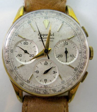 Gigandet Wakmann Chronograph Wrist Watch: Gigandet Wakmann Chronograph Wrist Watch: 3 dials on 1 with milemeter; silver with gold hands and markers. Stainless steel and base metal case, not opened. (The dial has started to darken.) Running at