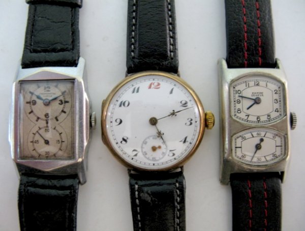 3 Swiss Wrist Watches, 1 is 15J: 3 Swiss Wrist Watches: 1.) Chronometer Lobes; works not marked, in a Chronos Swiss metal case. Ivory colored dial with gold numbers and indicators; dark blue hands. (Not running; dial scratched and di
