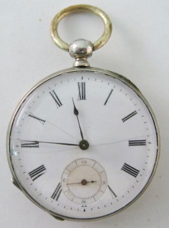 Openbare Armen Scholen Pocket Watch: Openbare Armen Scholen Pocket Watch: dated 1876; silver case no.15778. Key wind/key set; Quatre Jewels, cylinder no.15778. (Not running. Dial fractured.) All items sell As Is, Where Is, no guarantees