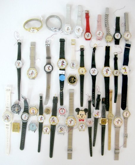Group of 43 Bradley Mickey Mouse Wrist Watches: Group of 43 Bradley Mickey Mouse Wrist Watches: large variety of styles, including; full figure Mickey; Mickey head; Mickey jogger; Mickey Mouse club; Mickey and Pluto; No.9999 Horlogeurs Gr.0,005; an