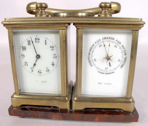French Combin. Barometer/Compass Carriage Clock: French Combination Barometer/Compass Carriage Clock: the movement is marked D.H. France. There is beveled glass on all sides. The cases are mounted on a brown marble base and is 5 1/4" x 6 5/8". A key