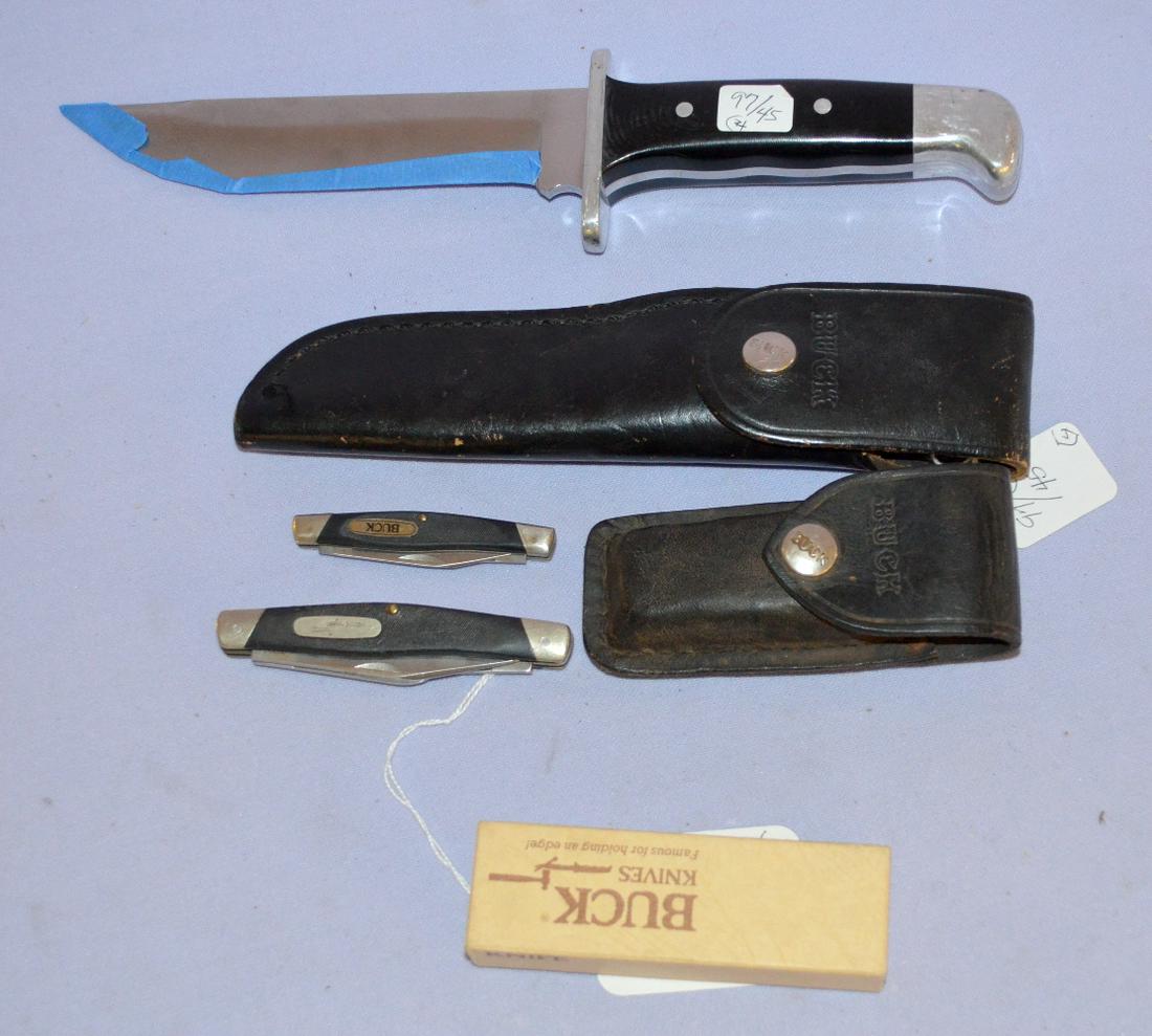 4 Buck knives and 2 boxes: 4 buck knives and 2 boxes. Two are belt knives - they are no 124 that is 11 3/4" long- no seath. A no. 118 with sheath, 8 1/2" long. A no. 301 and a no. 309 pocket type. Also a leather belt sheath for