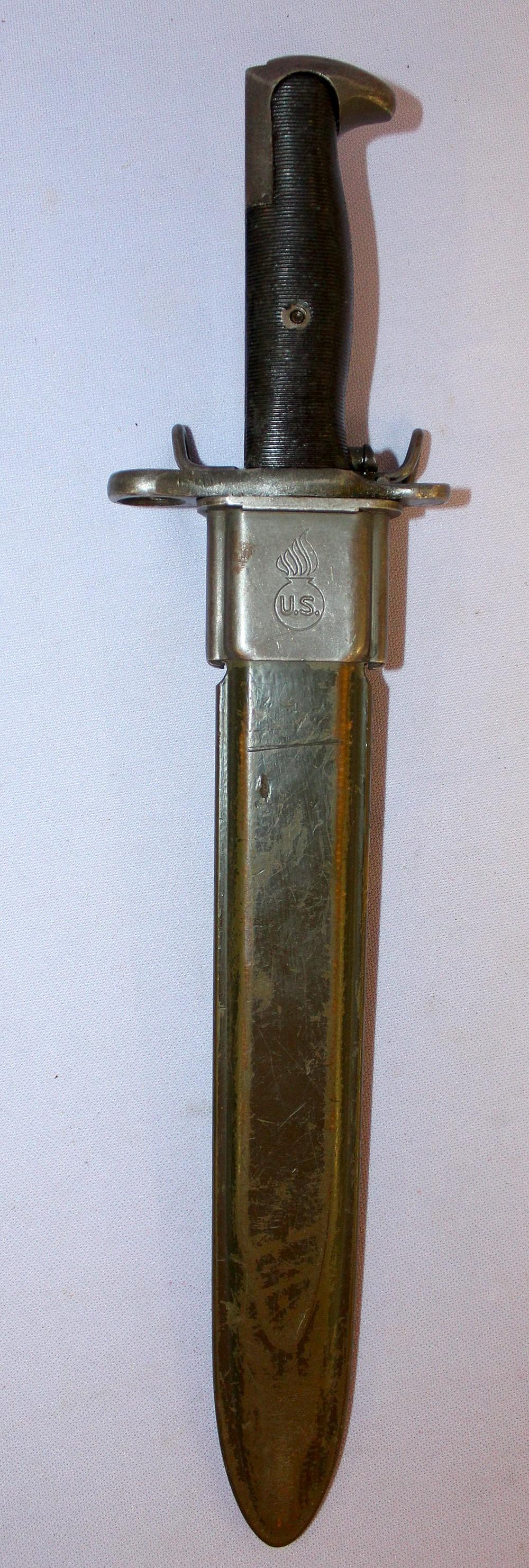U.S M19OS Bayonet & Sheath by AFH 1943: U.S M19OS Bayonet & Sheath by AFH 1943. Modified from 16" to 12" blade by AFH. It is with an M7 scabbard. The 14 1/2" bayonet has. The scabbard is scuffed up, a red 51 is painted on the back.