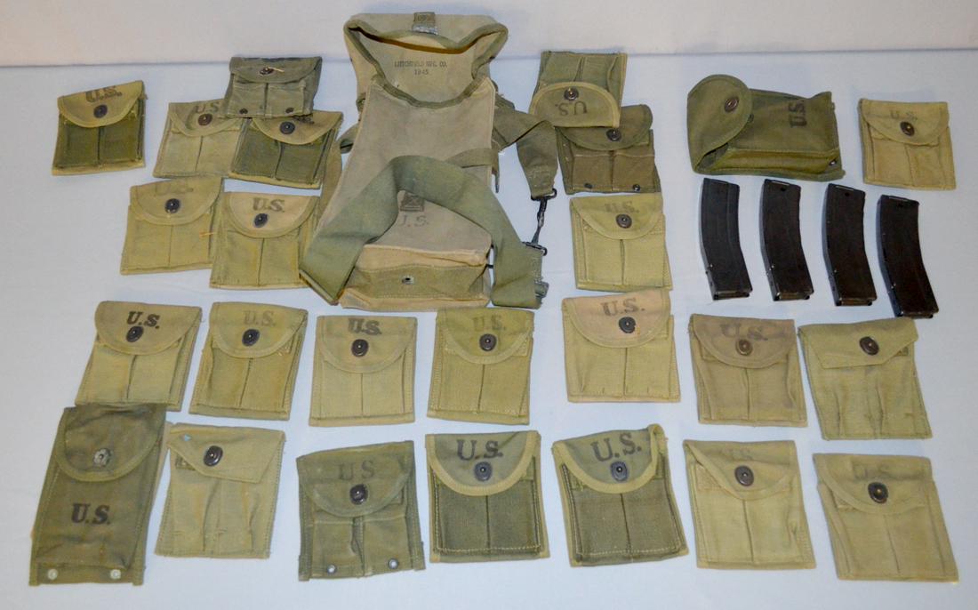 26 US Pocket Magazines Mixed lot of 8 Bags for 30 Cal.: 26 US Pocket Magazines Mixed lot of 8 Bags for 30 Cal. Ammo. One Holder has 4 - 30 Cal Carbine 30 round clips. Most are for the M1 Carbine. Made by various makers. Average size 5 1/4 " X 4 1/4" in gre