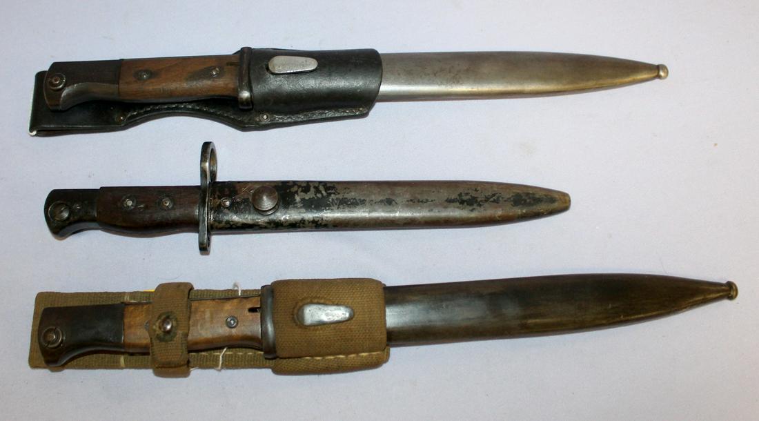 3 German WWII Bayonets: 3 German WWII Bayonets. 1- Serial Number- 1227 by PYY circa 1944. It is 15" long. 2- No. 5MK by ROF Poole. Scabbard is No. 5230. Length 11 3/4" 3- No. 5MK by Carl Eickhorn circa 1944.