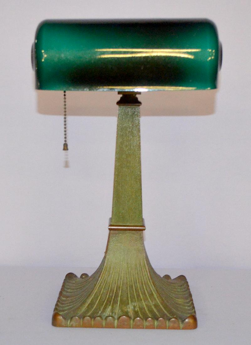 Antique Emeralite Desk Lamp: Antique Emeralite Desk Lamp w/ NCR Co. G.C Vail plaque on side, brass base w/ green patina, "Quota May/June 1922". Cased green scrolled shade is 9 1/2" W & 16 1/2" T. **This lot is FOB- Freight on Buy