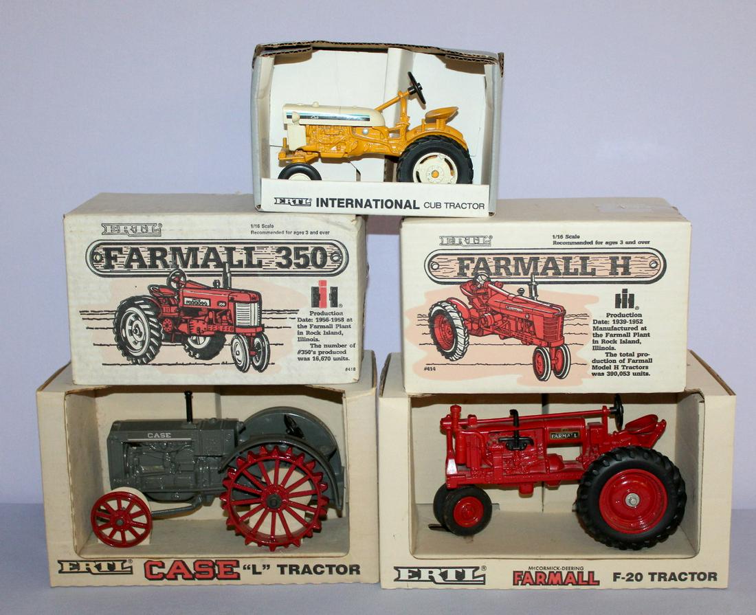 5 ERTL 1/16 scale toy tractors in boxes case L - 1987: 5 ERTL 1/16 scale toy in boxes case L - 1987. Formal L H 1986. 7350 formal 350. F. 20 formal 7-20 1987, 6" T by 11" W. Cub intermatl 1991