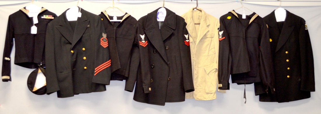 US Navy Seabees and Other Clothing: US Navy Seabees and other clothing. 1- Chief boatswaines mate jacket and pants, 2- 3rd classboatswain mate, dress blue blouse and pants. 3- seabee 3rd class tan shirt with axes on the patch. Carpenter
