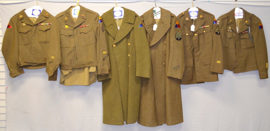 Armored forces clothing items: Armored forces clothing items. 1- over coat - technician 4th grade. 2- Tech. 5th grade jacket, 1st armoured air, and anti aircraft patches. 4-IKE jacket with 11 armoured divison patches. 5- IKE jacket