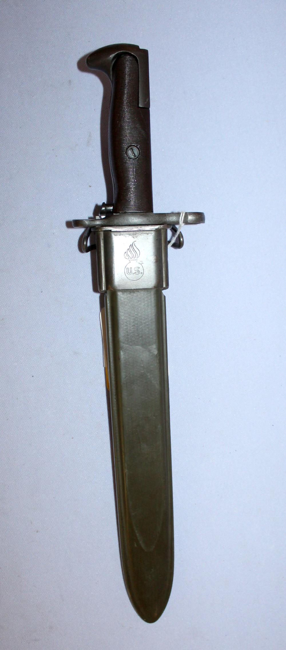 US Bayonet M1905E1: US Bayonet M1905E1. WW2 modification of 16" m1905 ro 6" M1 style spear point modification. Marked AFH US 1943. In a composite sheath it is 14 1/4" long. Well preserved