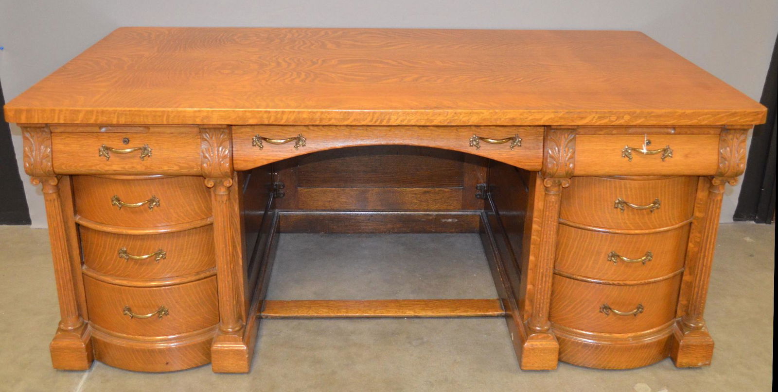 Carved Oak Executive Desk: Carved Oak Executive Desk: curved drawers and columns, 31"T x 72"W x 38"D