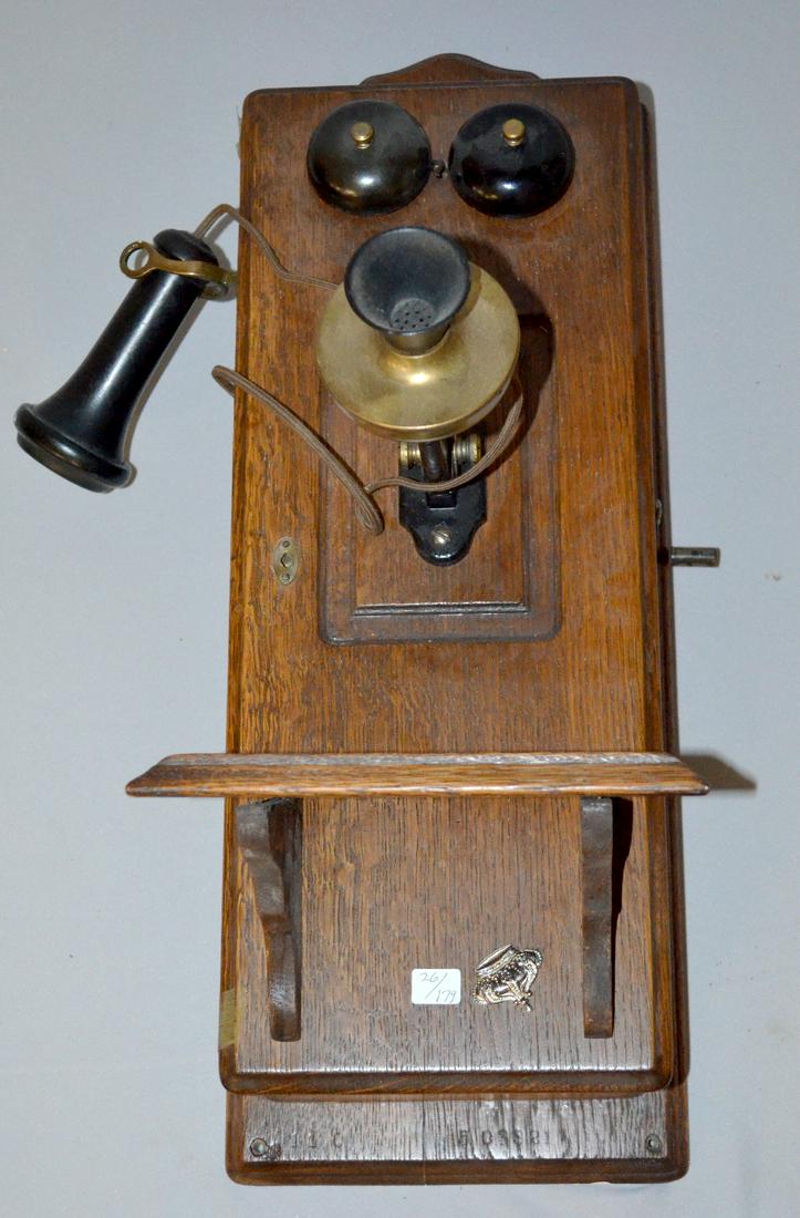Antique Oak Kellogg Wall Phone: Antique Oak Kellogg Wall Phone with working ringer, 24"L, 9 1/4"W and 14 3/4"D including mouth piece.