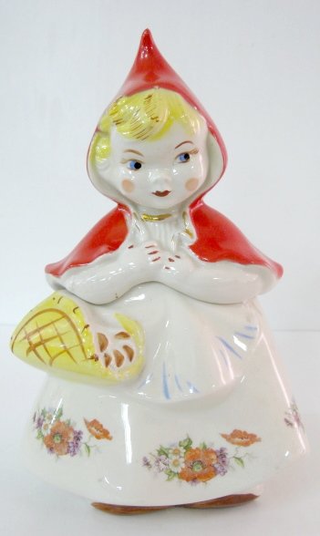 Little Red Riding Hood Pottery Cookie Jar: Little Red Riding Hood Pottery Cookie Jar: incised mark on bottom, unreadable; 3 poppy decals on skirt. (Light scratches to back of hood.) 13" All items sell As Is, Where Is, no guarantees of any kind