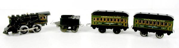 American Flyer 4pc. Cast Iron Train Set, Electric: American Flyer 4pc. Cast Iron Train Set, Electric: 1.) Locomotive (New wheels), 7 1/2" 2.) Tender (Re-mint top side), 5" 3.) American Flyer 1107 Passenger Car, 5 3/8" 4.) American Flyer 1107 Passenger