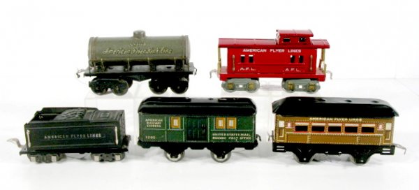 5 American Flyer Train Cars: 5 American Flyer Train Cars: 1.) American Flyer Passenger Car, tin litho, 6 3/8" 2.) American Railway Express United States Mail Railway Post Office Car 1205, 6 3/8" 3.) 8 wheel tank car no.1118, 6 3/