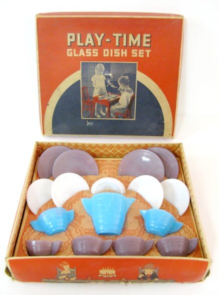 Akro Agate Play-Time Glass Dish Set: Akro Agate Play-Time Glass Dish Set: in original box; consists of blue sugar, creamer and pitcher with white lid. 4 white plates, 4 purple plates and 4 purple cups. Akro Crow mark on bottoms of dishes