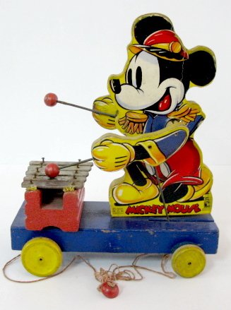 Fisher Price No.795 Mickey Mouse Toy: Fisher Price No.795 Mickey Mouse Toy: xylophone player; original; dated 1939 W.D.P. (Paint loss to base; edge wear and paper tears; corrosion to metal plates.) 11" x 9" All items sell As Is, Where Is,