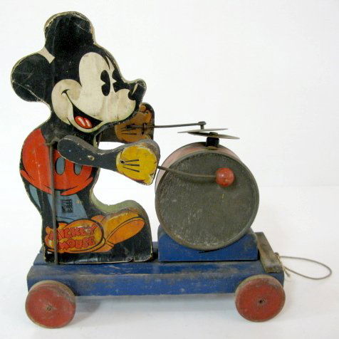 Fisher Price No.795 Mickey Mouse Drummer Toy: Fisher Price No.795 Mickey Mouse Drummer Toy: pie eyed Mickey; introduced 1937. (Paper and edge wear; staining; one side of paper is gone; metal corrosion.) 10 3/4" x 9" All items sell As Is, Where Is