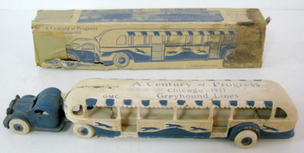 Arcade 1933 Chicago Fair Greyhound Lines Bus: Arcade 1933 Chicago Fair Greyhound Lines Bus: cast iron; with original box; top of bus says "A Century of Progress Chicago 1933 Greyhound Lines", "GMC"; "1933 A.M.C." on the side; tires marked Arcade