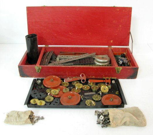 Metal Erector Set in Wood Box: Metal Erector Set in Wood Box: not marked; a lot of pieces, but not sure if it is complete. The box is marked New Erector A.C. Gilbert Co. New Haven, Conn (Wooden box is rough with some pieces missing