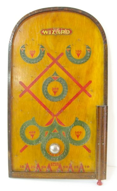 The Wizard Table Top Pinball Game: The Wizard Table Top Pinball Game: all wood. (No ball; some paint loss to label.) 23 1/2" x 13 1/2" All items sell As Is, Where Is, no guarantees of any kind. We accept Mastercard & Visa, no paypal, n