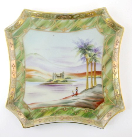 Hand Painted Nippon Tray: Hand Painted Nippon Tray: green and gold border resembling slag glass. Central scene of an island temple and palm trees with 2 people near them. 2 porcelain loops are applied for hanging. (Worn gold o