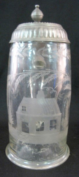Early Glass Stein w/House: Early Glass Stein w/House: the clear glass body, over 1 liter in size has a sturdy base and minimally tapered shape to the lid. A house with smoking chimney and 3 trees are ground into it. The pewter