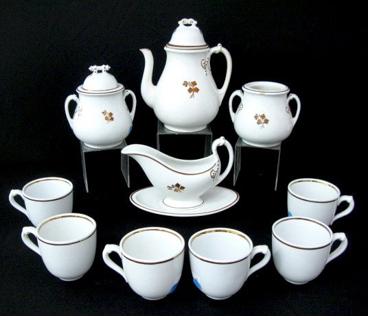 11pcs Tea Leaf Ironstone China by Furnival: 11pcs Tea Leaf Ironstone China by Furnival: includes teapot, 9 1/2" (there is some staining and short hairlines); 2 sugars with 1 lid, 7" (the lid has an under edge chip, 1 has a bit of interior stain