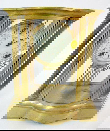 Seth Thomas "Empire No.65" Crystal Regulator: Seth Thomas "Empire No.65" Crystal Regulator: 8 day time with half hour gong strike and a 4 1/2" floral painted dial. In a gilt metal case with curved and beveled glass front door and beveled glass on