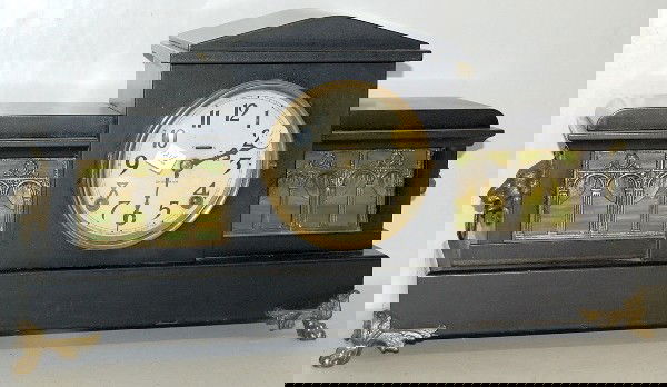 Ingraham Mecca Mantle Clock: Ingraham Mecca Mantle Clock: ebonized wood with decorative panels and a 5" dial. 8 day time with gong/bell strike. (Running, but the strike does not activate.) 10 7/8" x 20 3/4" All items sell As Is,