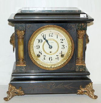 Seth Thomas Arno Adamantine Lion Head Mantle: Seth Thomas Arno Adamantine Lion Head Mantle: 8 day; half hour strike; half hour on cup bell; hour on cathedral bell; paper dial. Has pendulum, no key. Partial paper label on back. (Dial is worn; pain