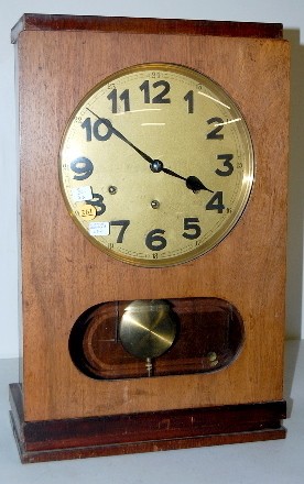 L. Furtwangler & Sohn Chime Clock: L. Furtwangler & Sohn Chime Clock: 8 hammers strike 8 straight rod gongs on the quarter hour. The movement is signed and numbered 158387. The trademark LFS in a geared wheel was registered in 1881. It