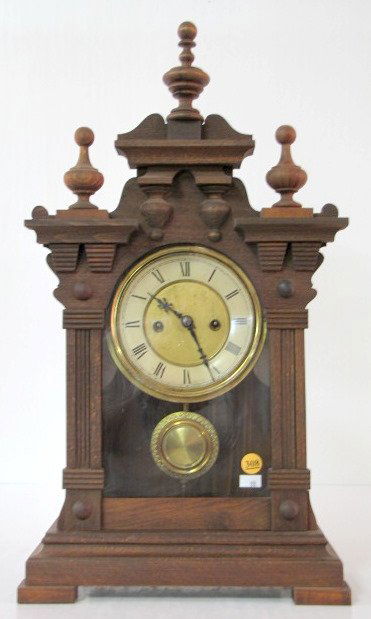 German Pine Shelf Clock: German Pine Shelf Clock: t & S; old dial; key and pendulum. Metal tag on back "H.A.C. Make, Made in Wurttemberg. (dial discolored, does not run.) 21 1/4" x 12" All items sell As Is, Where Is, no guara