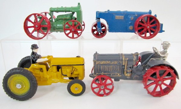 4 Arcade Tractor/Steam Rollers: 4 Arcade Tractor/Steam Rollers: 1.) No.276-3 McCormick Deering tractor. (Repainted with new driver.) 2.) No.720 tractor. (Repainted; slight chipping to hat.) 3.) No.2918 steam roller. (Repainted.) 4.)