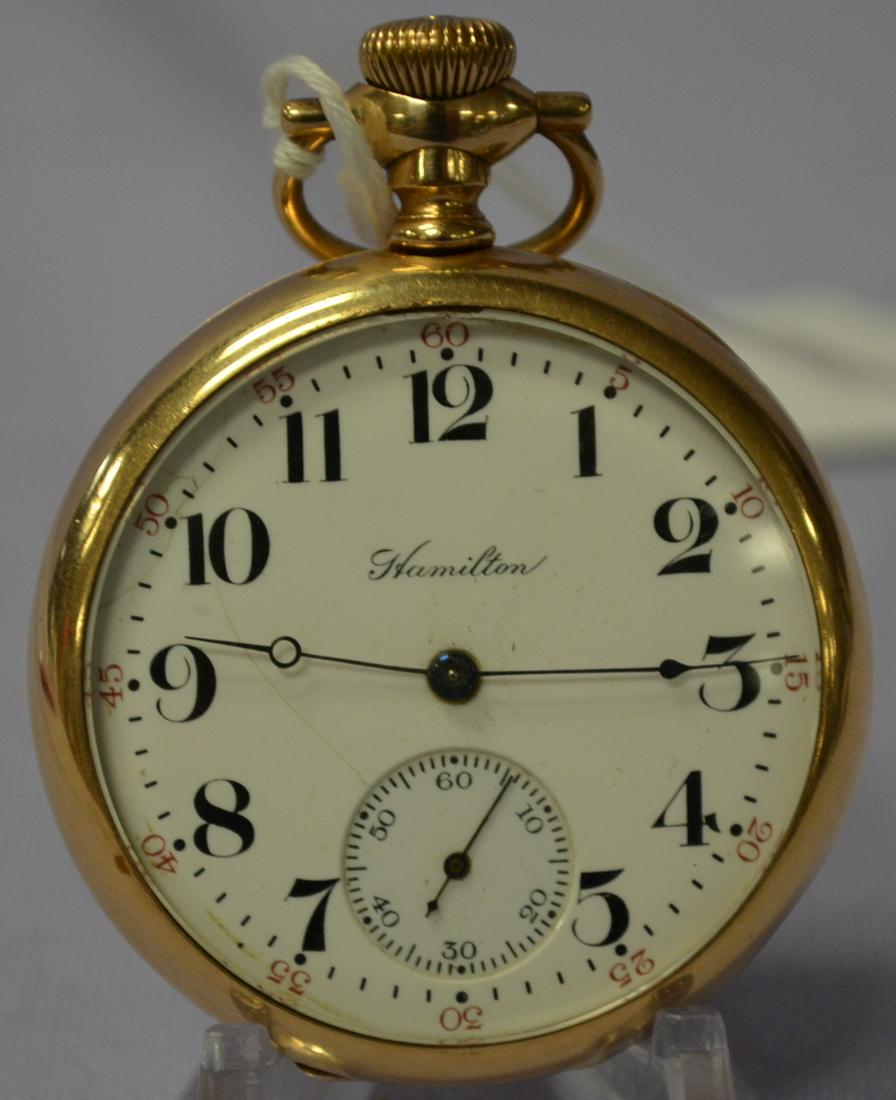 Hamilton 16S OF GF PS 3/4 DMK ADJ No. 766793 Pocket: Hamilton 16S OF GF PS 3/4 DMK ADJ No. 766793 Pocket Watch. In a yellow swing out CWCCO No. 1834793 case. Running. The machined case back has some scuffing and denting. The SSD has a hairline.