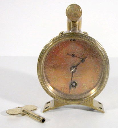 Chelsea for Warner Instruments Brass Clock: Chelsea for Warner Instruments Brass Clock: time only with a 2 1/2" copper dial with seconds dial. Warner Instruments- Beloit, Wisconsin is below the hands. A brass tube with removable front is attach