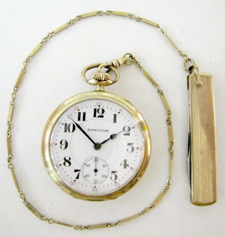 Hamilton 992 21J 16S OF LS GJS GT GF Pocket Watch: Hamilton 992 21J 16S OF LS GJS GT GF Pocket Watch: serial no.2342783; adjusted 5 positions. In a yellow hinged Keystone 10K gold filled case, numbered 9376969. A chain and pen knife are attached. (The